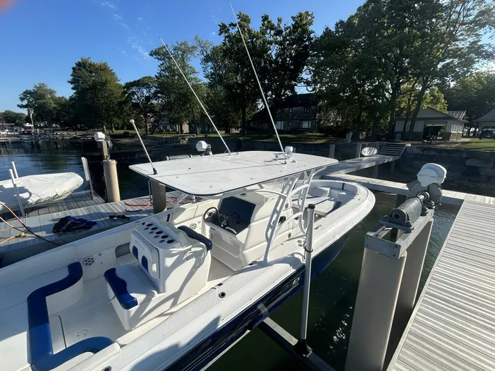  Yacht Photos Pics 2016 Midnight Express 37 Open boat docked at marina, featuring sleek design and spacious deck.