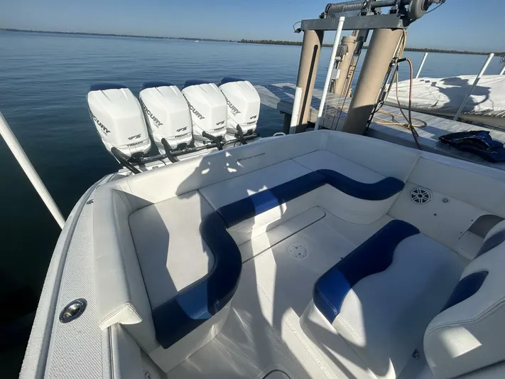  Yacht Photos Pics 2016 Midnight Express 37 Open boat with four outboard engines and spacious seating.