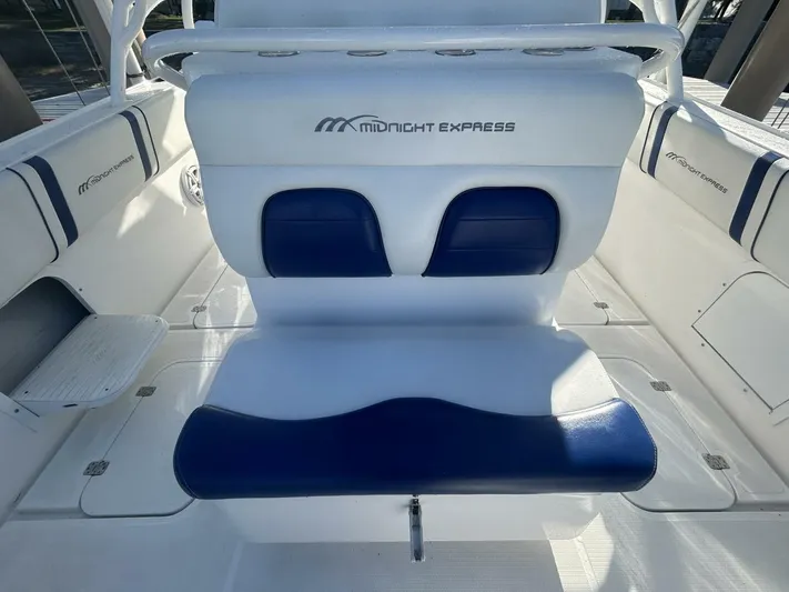  Yacht Photos Pics 2016 Midnight Express 37 Open boat interior with blue and white seating.