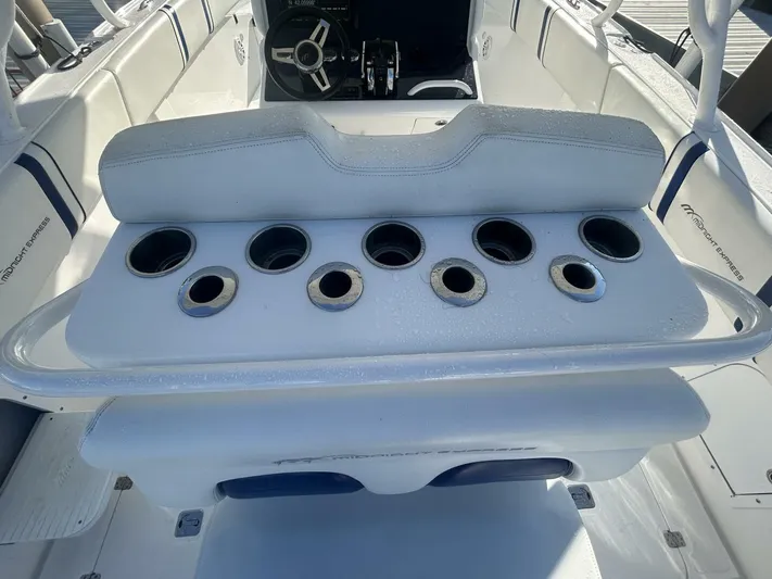  Yacht Photos Pics 2016 Midnight Express 37 Open boat interior with multiple cup holders and seating.