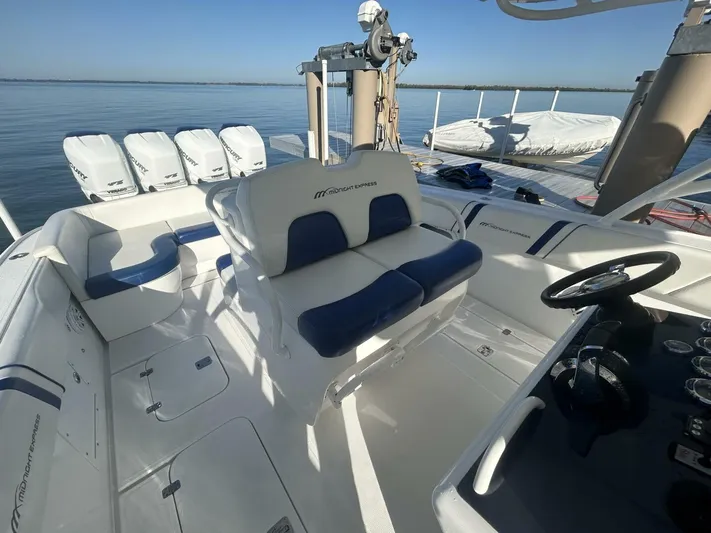  Yacht Photos Pics 2016 Midnight Express 37 Open boat interior with seating and controls.