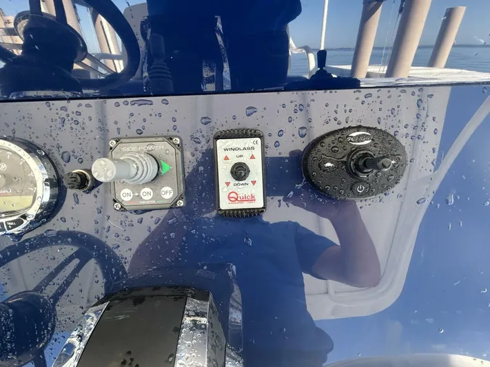  Yacht Photos Pics Control panel of a 2016 Midnight Express 37 Open boat with water droplets.