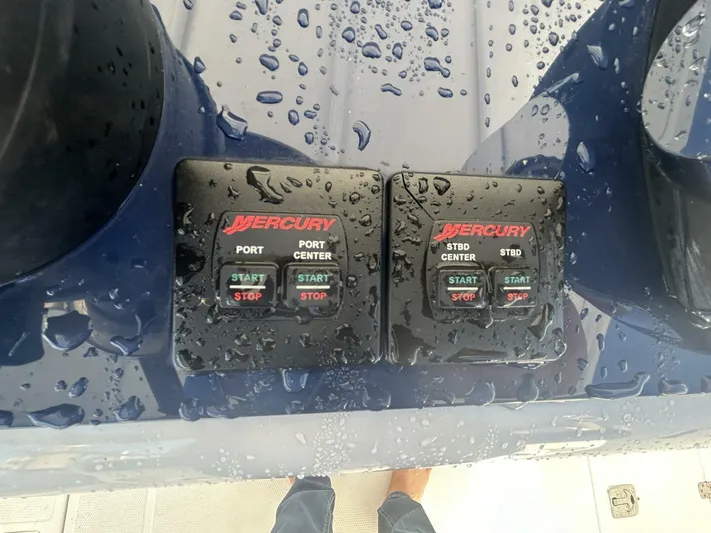  Yacht Photos Pics Wet Mercury engine controls on a 2016 Midnight Express 37 Open boat.
