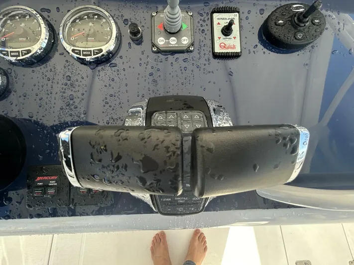  Yacht Photos Pics Wet control panel of a 2016 Midnight Express 37 Open boat with gauges and controls.