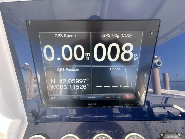  Yacht Photos Pics GPS display on a 2016 Midnight Express 37 Open boat showing speed and coordinates.