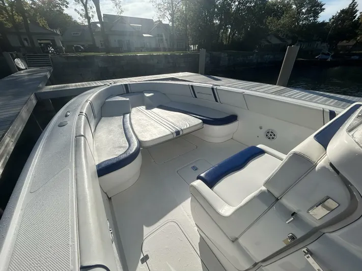  Yacht Photos Pics 2016 Midnight Express 37 Open boat interior with spacious seating and sleek design.