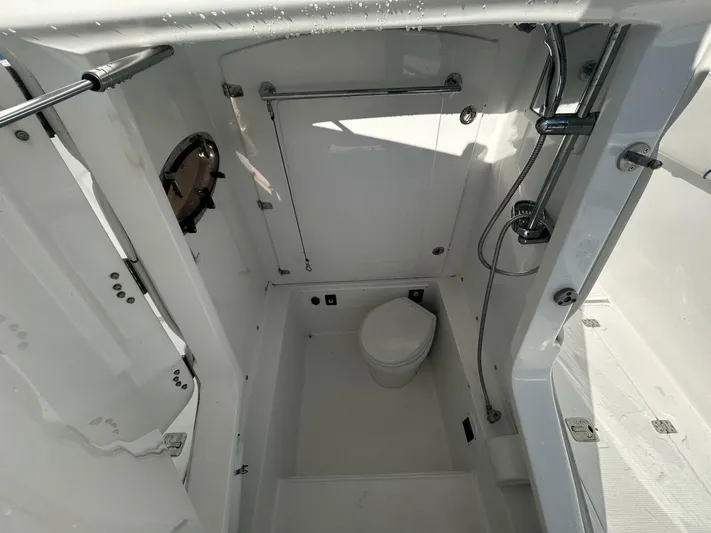  Yacht Photos Pics 2016 Midnight Express 37 Open boat bathroom with shower and toilet.
