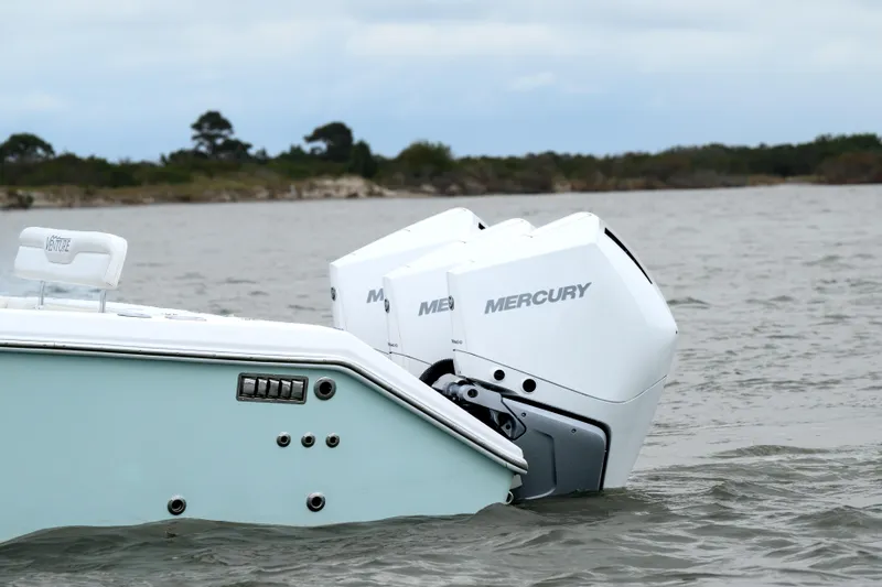 Comeback Yacht Photos Pics 2008 Venture 39 Cuddy boat with dual Mercury outboard engines on water.