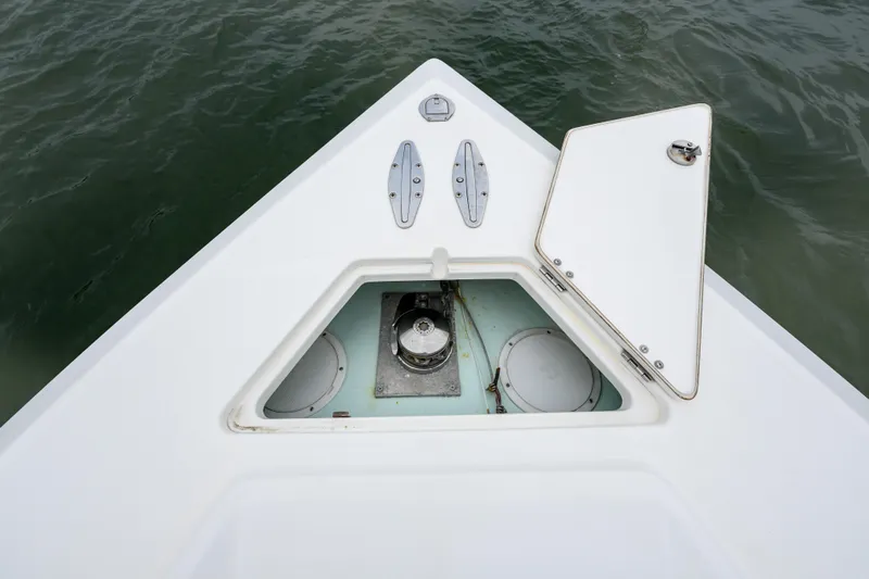 Comeback Yacht Photos Pics Bow of 2008 Venture 39 Cuddy boat with open anchor hatch.