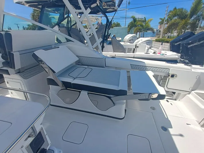  Yacht Photos Pics 2025 Blackfin 302 DC boat interior with adjustable seating and modern design.