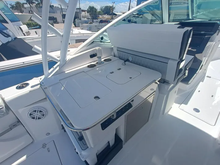  Yacht Photos Pics 2025 Blackfin 302 DC boat interior with sleek white design and modern amenities.