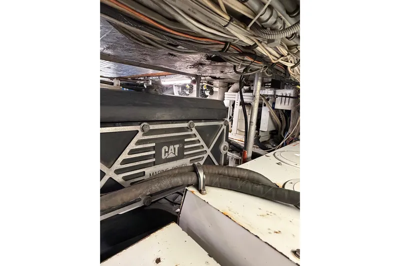 Pura Vida Yacht Photos Pics Engine room of 1985 Bertram 54 Convertible with CAT marine power system.