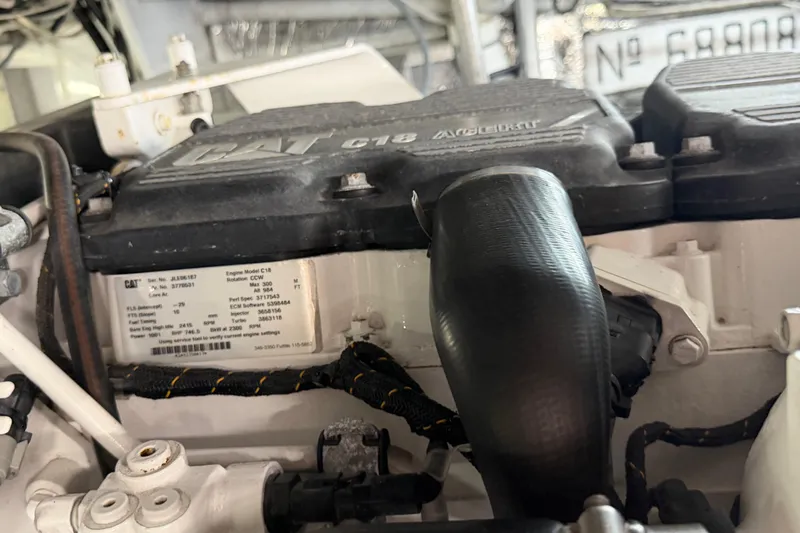 Pura Vida Yacht Photos Pics Engine compartment of a 1985 Bertram 54 Convertible with CAT C18 engine.