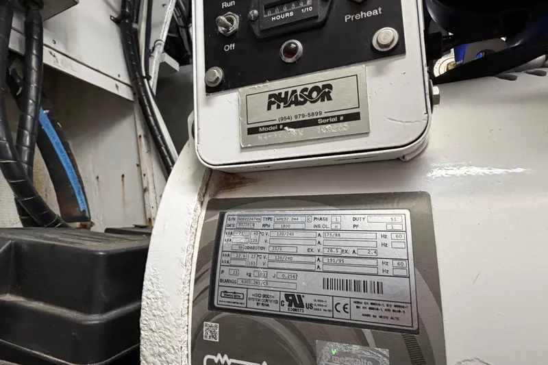 Pura Vida Yacht Photos Pics Control panel and specifications on a 1985 Bertram 54 Convertible boat.