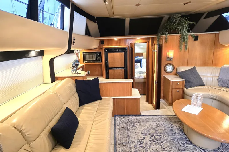 Embracing Life Yacht Photos Pics Luxurious interior of 2004 Meridian 459 Motoryacht with elegant seating and modern amenities.