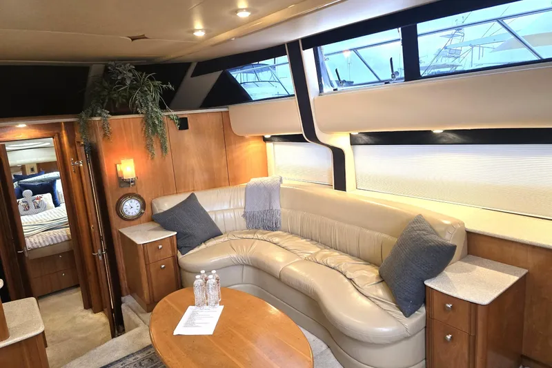 Embracing Life Yacht Photos Pics Luxurious interior of 2004 Meridian 459 Motoryacht with leather seating and elegant decor.