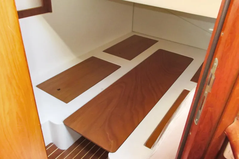 Manon Yacht Photos Pics Interior cabin of 2008 Mano Marine 38.50 boat with wooden flooring.
