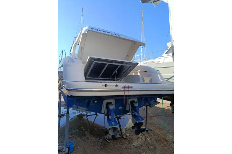 Manon Yacht Photos Pics 2008 Mano Marine 38.50 boat on dry dock, rear view with open hatch.