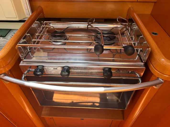 Pacifico Yacht Photos Pics Stainless steel stove in 2005 Beneteau First 44.7 yacht kitchen.