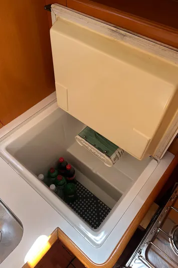 Pacifico Yacht Photos Pics Beneteau First 44.7 (2005) yacht refrigerator with beverages inside.