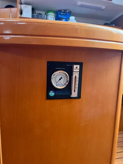 Pacifico Yacht Photos Pics Interior of 2005 Beneteau First 44.7 yacht with barometer and thermometer.