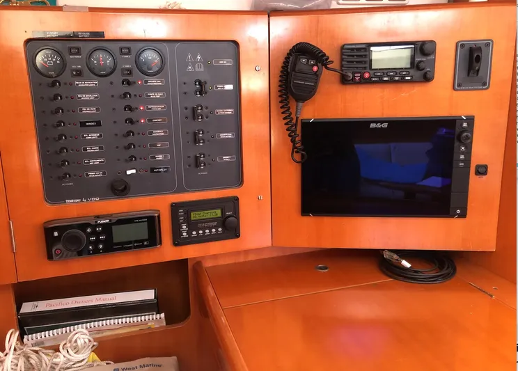 Pacifico Yacht Photos Pics Control panel of a 2005 Beneteau First 44.7 yacht with navigation equipment.