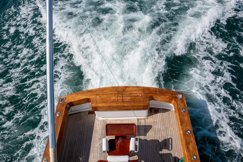 Break Time Yacht Photos Pics 2007 Custom Carolina Layton Express boat cruising on ocean waters, view from deck.