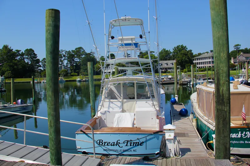 Break Time Yacht Photos Pics 2007 Custom Carolina Layton Express boat docked at marina, Wrightsville Beach, NC.