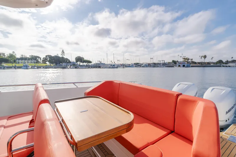 Intrepid Yacht Photos Pics Luxury seating on 2021 Nimbus T11 boat with scenic marina view.