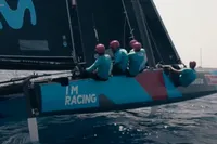 Sailing team racing on GC 32 catamaran, 2012 model, in open water.