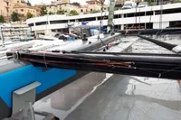 Sailing yacht GC 32, 2012 model, docked in a marina with visible rigging and equipment.
