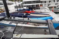 Boats docked at a marina, featuring a 2012 GC 32 model sailboat.