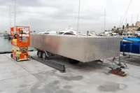 Trailer with diamond plate design at marina, GC 32 model, 2012.