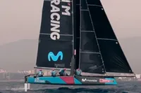 Sailing catamaran "I'M RACING" on water, featuring GC 32 model, 2012.
