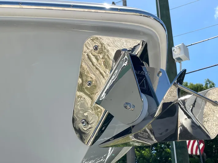 Whisper Gray Yacht Photos Pics 2025 Everglades 315 Center Console boat anchor detail with polished metal finish.