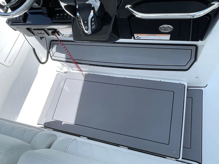 Whisper Gray Yacht Photos Pics 2025 Everglades 315 Center Console boat interior with sleek dashboard and seating.