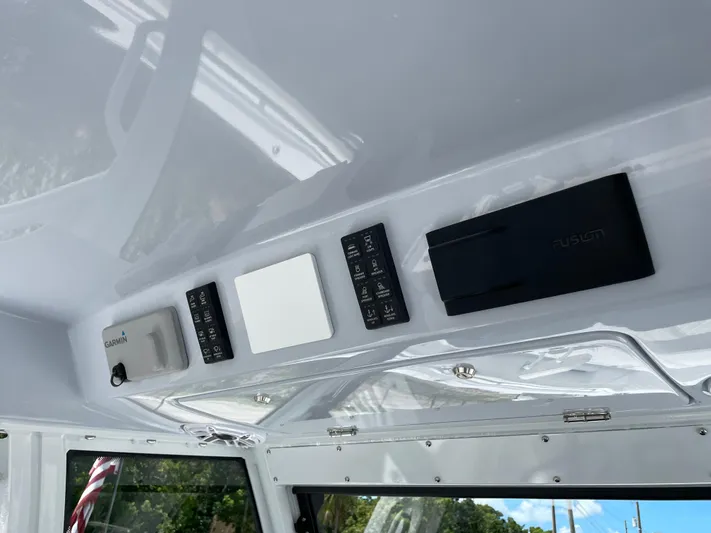 Whisper Gray Yacht Photos Pics Control panel of 2025 Everglades 315 Center Console boat interior.