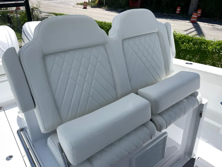 Whisper Gray Yacht Photos Pics 2025 Everglades 315 Center Console boat with luxurious white leather seating.