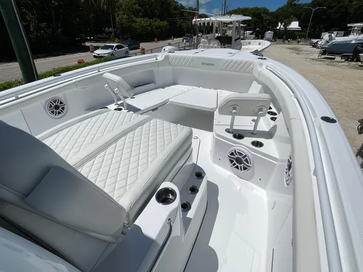 Whisper Gray Yacht Photos Pics 2025 Everglades 315 Center Console boat with luxurious seating and modern design.