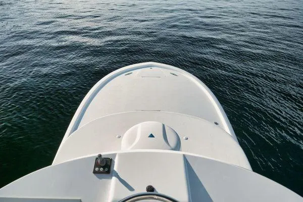 Candy Ride Yacht Photos Pics Bow view of 2011 Winter Custom Yachts 29 on calm water.