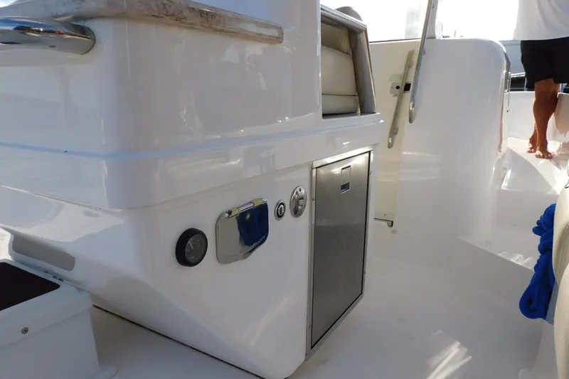 Happily Ever After Yacht Photos Pics Interior view of a 2016 Belzona 327 WA boat, featuring sleek white surfaces.