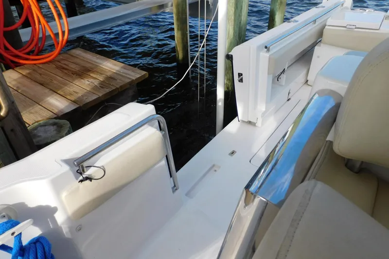 Happily Ever After Yacht Photos Pics Belzona 327 WA 2016 boat interior with open side door and dock view.