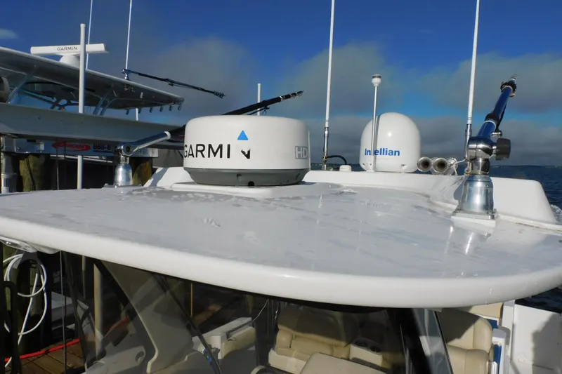 Happily Ever After Yacht Photos Pics 2016 Belzona 327 WA boat with Garmin and Intellian equipment on the roof.