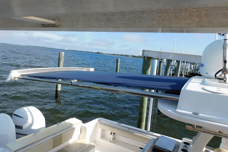 Happily Ever After Yacht Photos Pics 2016 Belzona 327 WA boat with Yamaha engines docked by the water.