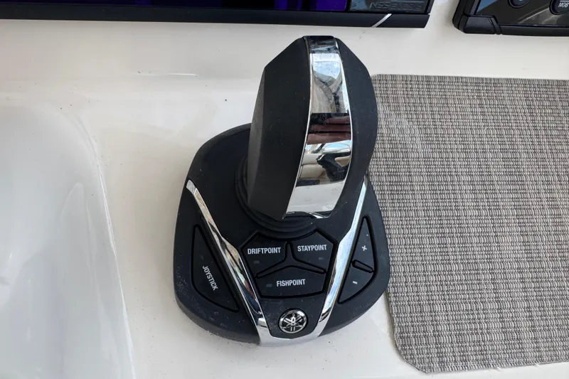 Texas Crewed Yacht Photos Pics Joystick control panel on 2024 Grady-White Freedom 335 boat, featuring DriftPoint and StayPoint functions.