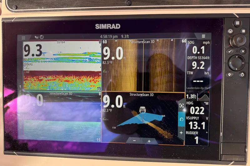 Texas Crewed Yacht Photos Pics Simrad marine display on 2024 Grady-White Freedom 335 showing sonar and navigation data.