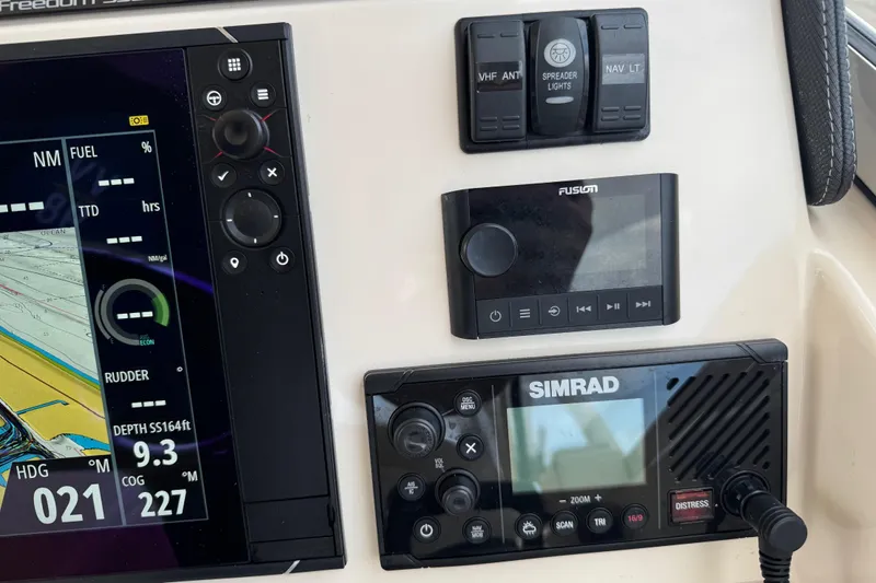 Texas Crewed Yacht Photos Pics Control panel of 2024 Grady-White Freedom 335 boat with navigation and audio systems.