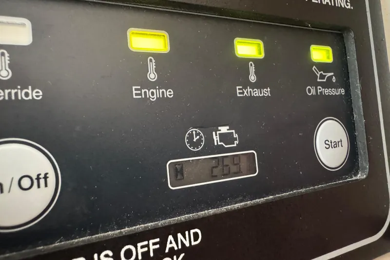 Texas Crewed Yacht Photos Pics Control panel of 2024 Grady-White Freedom 335 boat, displaying engine, exhaust, and oil pressure indicators.