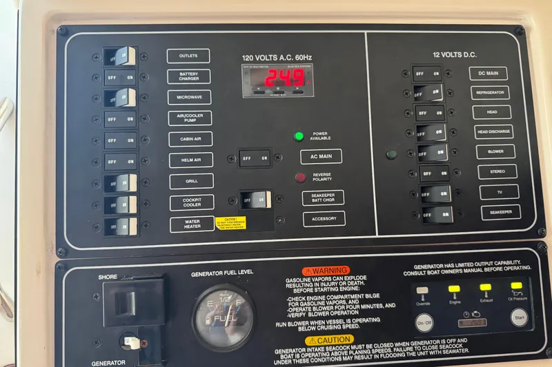 Texas Crewed Yacht Photos Pics Electrical control panel of 2024 Grady-White Freedom 335 boat, showing switches and gauges.