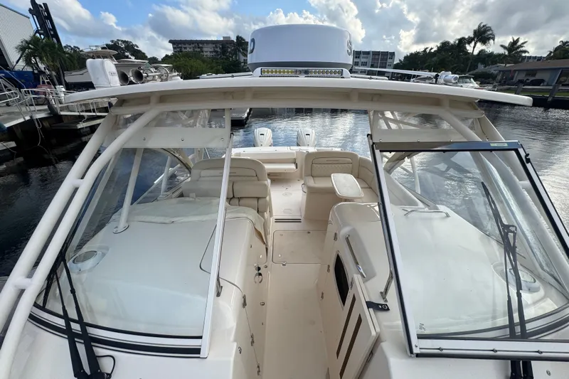 Texas Crewed Yacht Photos Pics 2024 Grady-White Freedom 335 boat interior with open cockpit and seating.